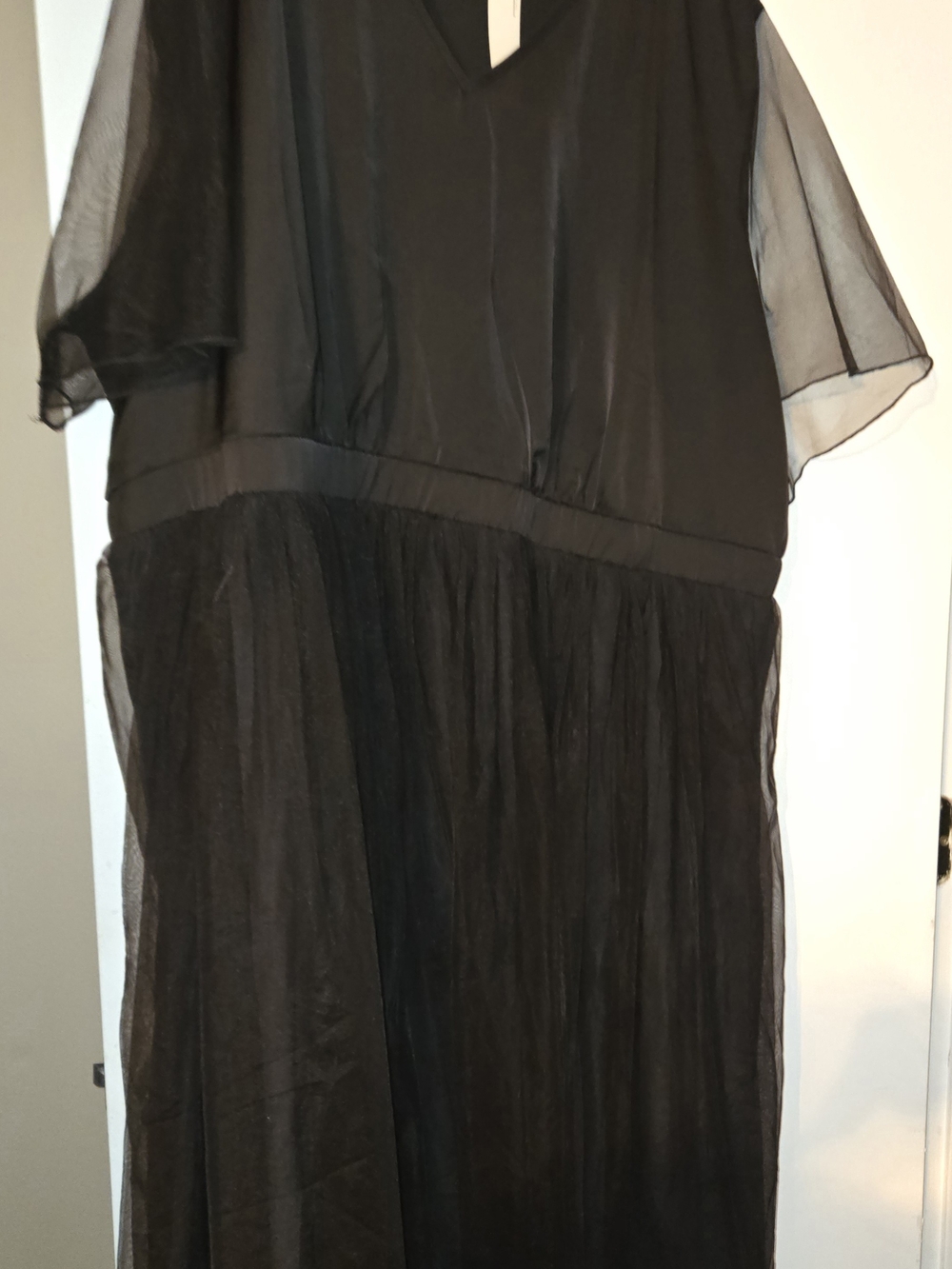 BloomChic Black Sheer Midi Dress with V-Neckline